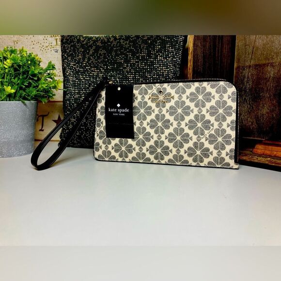 kate spade Handbags - Lucy Spade Flower Medium L-zip Wristlet/Clutch